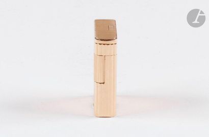 DUNHILL Paris. Gasoline lighter in yellow...