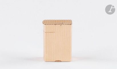 DUNHILL Paris. Gasoline lighter in yellow...