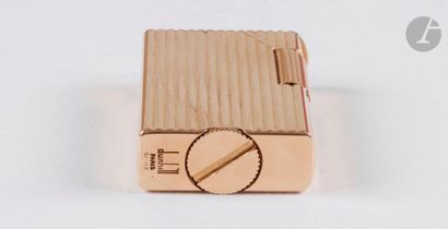 DUNHILL Paris. Gasoline lighter in yellow...