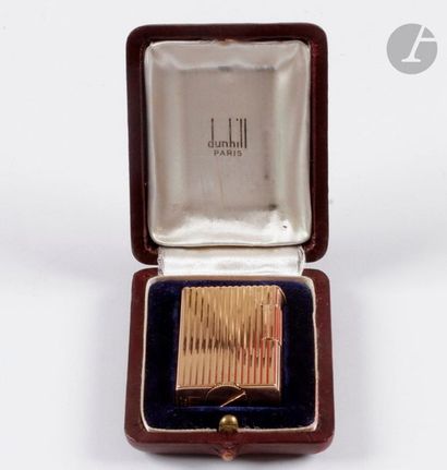 DUNHILL Paris. Gasoline lighter in yellow...