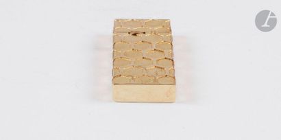 Gas lighter in yellow gold 750/00. Honeycomb...