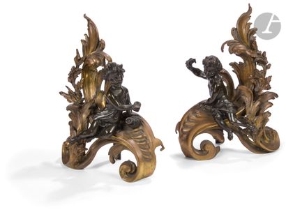 Paire de chenets aux enfants en bronze patiné...