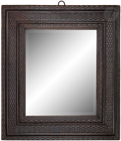 Miroir à large encadrement en bois noirci...