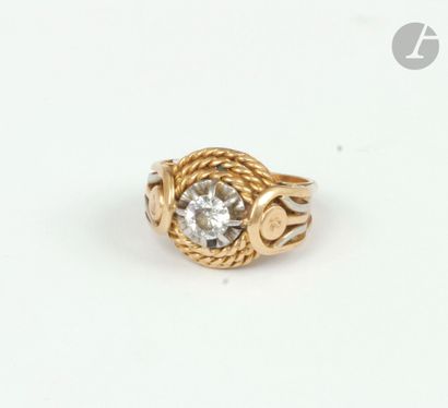 Bague en or 18K (750), ornée d’un diamant...