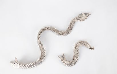 Demi-parure en argent représentant des poissons...
