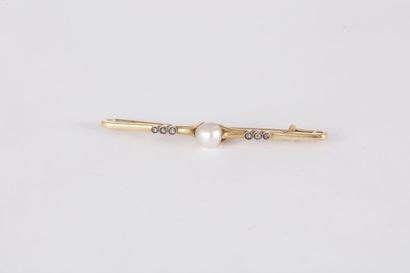 Broche-barrette en or 18K (750) ornée d’une...