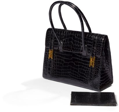 ***HERMèS

Modèle « Drag » sac porté main...