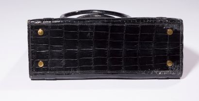 ***HERMèS

Modèle « Drag » sac porté main...