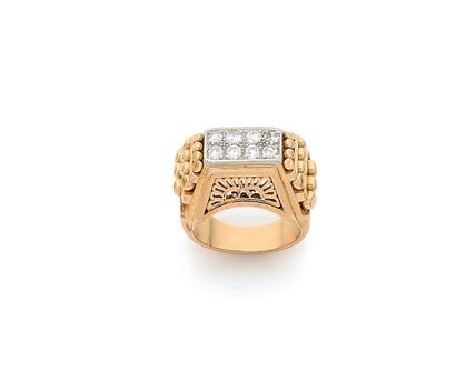Bague en or 18K (750), ornée de 8 diamants...