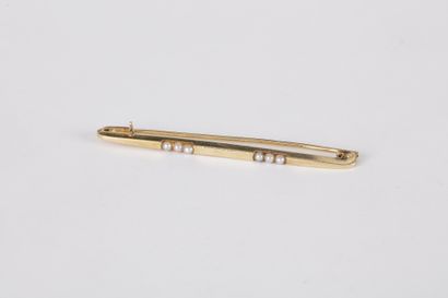 Broche-barrette en or 18K (750) sertie de...