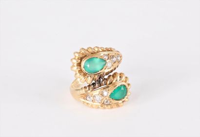 Bague croisée en or 18K (750) sertie de deux...