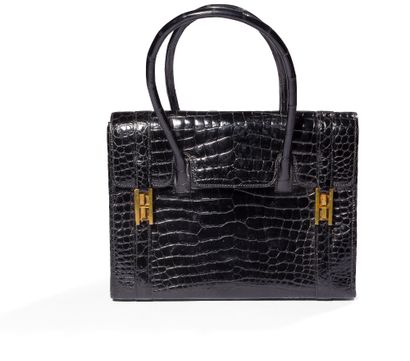 ***HERMèS

Modèle « Drag » sac porté main...