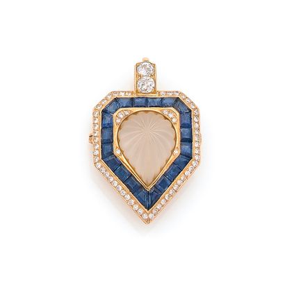 Broche-pendentif en or 18K (750) formant...
