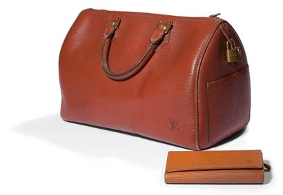 Louis VUITTON

Sac Speedy en cuir épi cognac,...