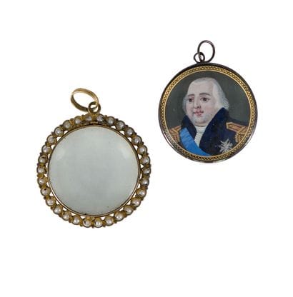 Médaillon ouvrant en or 14K (750), agrémenté...