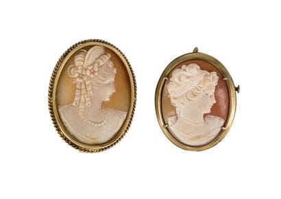 Broche en or 18K (750) torsadé, ornée d'un...