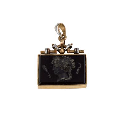 
Pendentif sceau en or 9K (375) et platine,...