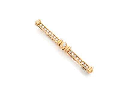 Broche-barette en or 18K (750), sertie de...