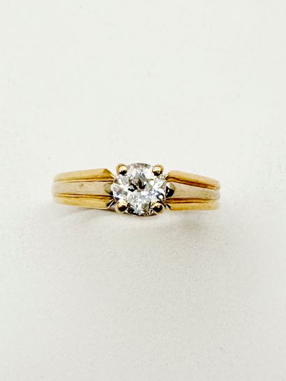 Bague en or 18K (750), sertie d'un diamant...