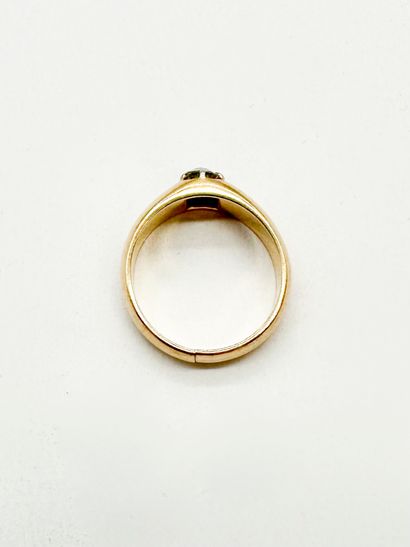 Bague en or 18K (750), ornée d'un diamant...