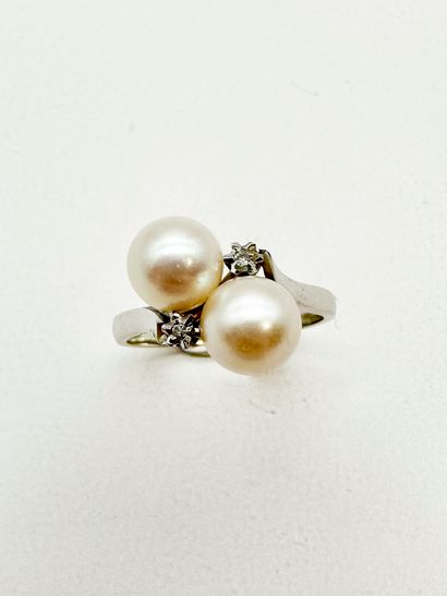 Bague croisée en or gris 18K (750) ornée...