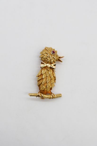 Broche représentant un oisillon sur sa branche...