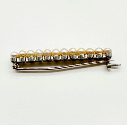 Broche-barette en or gris 18K (750), ornée...