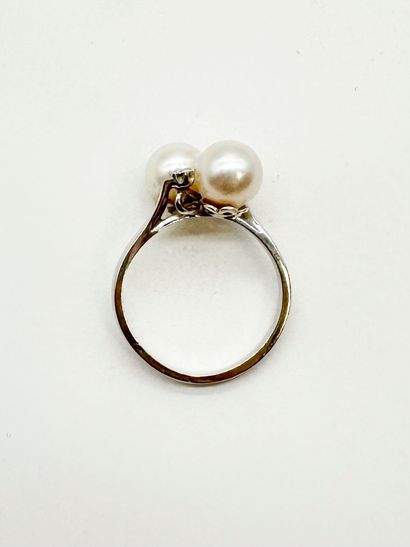 Bague croisée en or gris 18K (750) ornée...