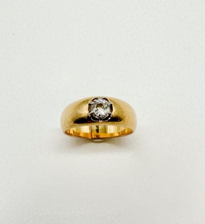 Bague en or 18K (750), ornée d'un diamant...