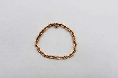 Bracelet en or 18K (750) articulé de maillons...