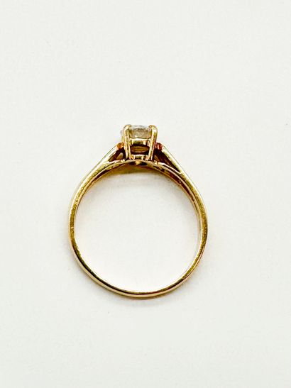 Bague en or 18K (750), sertie d'un diamant...