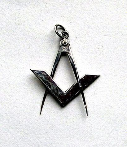 Bijou pendentif compas-équerre en argent....