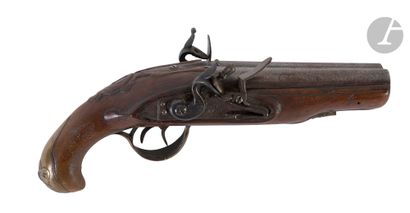 Double flintlock pistol. 
Round tabletop...