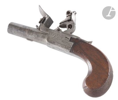 Pistolet à coffre à silex. 
Canon rond à...