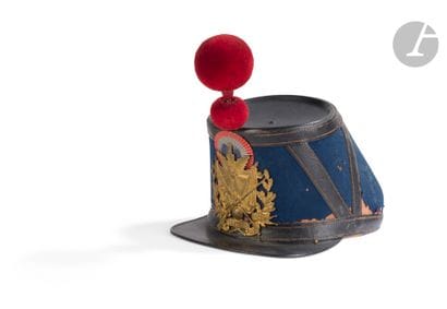 Shako de l’ESM St Cyr modèle 1872. 
Fut recouvert...