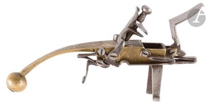 Flintlock lighter pistol. 
Brass case and...
