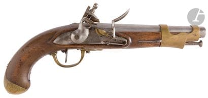 An IX flintlock pistol. 
Round barrel with...