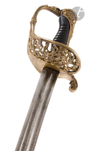 Sabre d’officier de marine. 
Poignée en corne...
