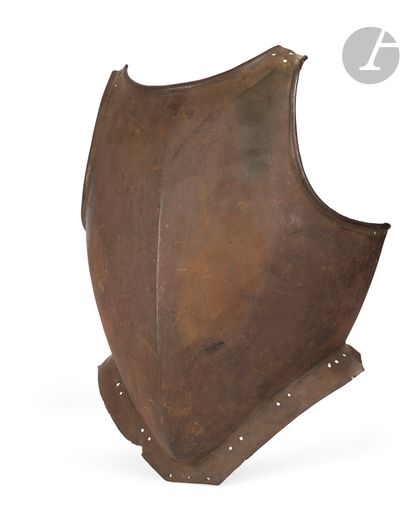 Plastron de cuirasse. 
En fer forgé, à bordure...