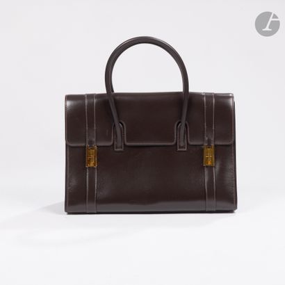 HERMÈS PARIS
1979
Petit sac DRAG V en box...