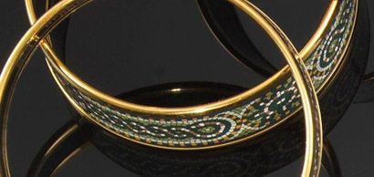 HERMES
Bracelet en métal doré, à décor de...