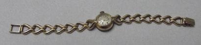 Montre de dame en or jaune, cadran rond,...