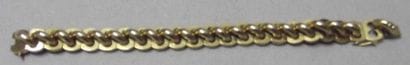Bracelet gourmette en or jaune. Poids: 42,9...