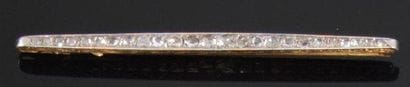 Broche barrette en or jaune et or gris sertie...