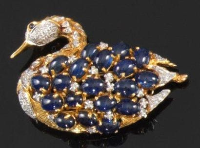 Broche-clip en or jaune et gris, en forme...