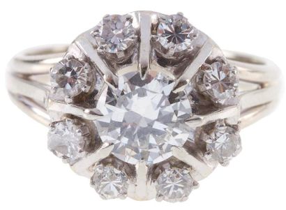 Bague fleur stylisée en fils d'or gris et...
