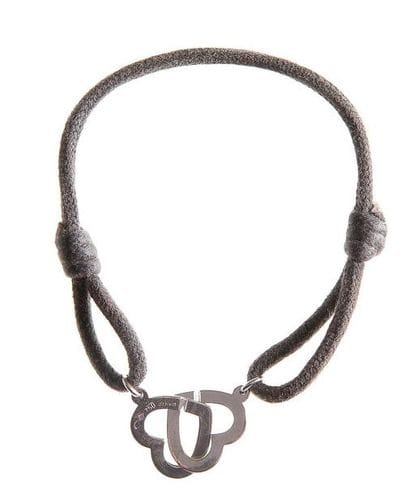 DINH VAN
Bracelet coeurs en or gris sur lien...