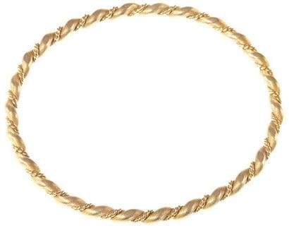 Bracelet jonc torsadé en or jaune. Poids:...