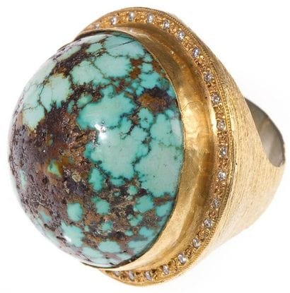 Large bague en argent doré, ornée d'une turquoise...