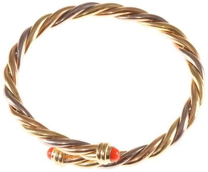 CARTIER
Bracelet en trois tons d'or torsadé,...